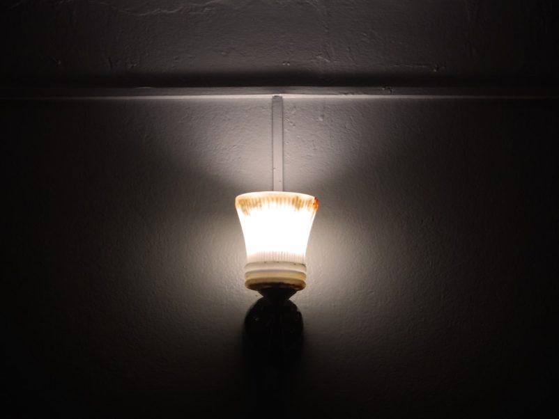 Photo motion sensor lamp